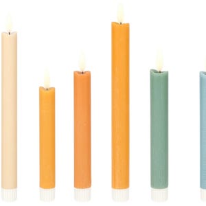 May include: A collection of eight colorful taper candles in varying heights. The candles are in shades of cream, yellow, orange, green, and blue. Each candle has a white base and a flickering flame at the top.
