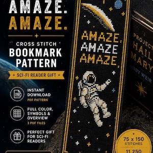 May include: A cross stitch bookmark pattern featuring a black background with a yellow border, a white astronaut, a yellow star, and the text AMAZE. AMAZE. AMAZE. The design includes a total of 11,250 stitches measuring 75 by 150 stitches.