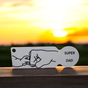 Einkaufswagenlöser Super Dad