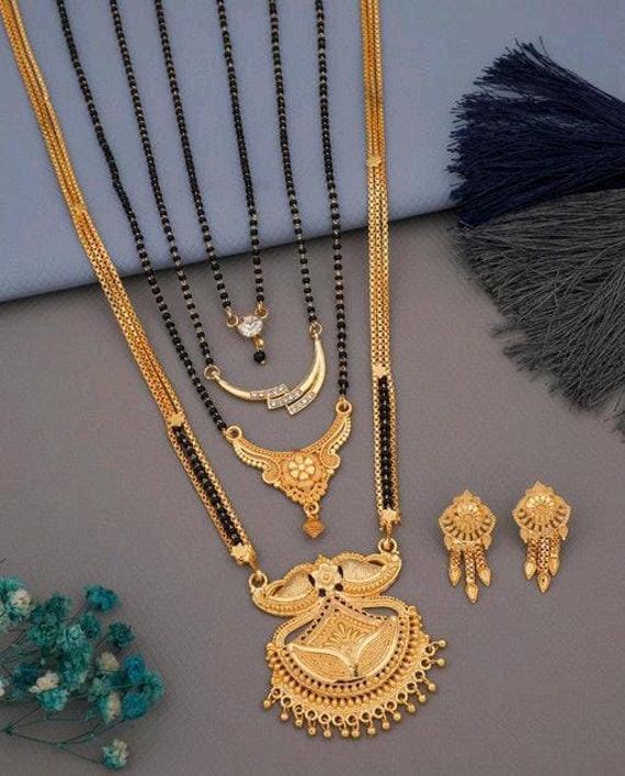 Gold long mangalsutra designs catalogue discount