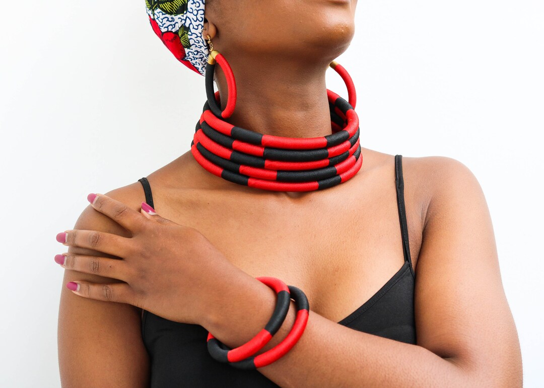 Yuya multicoloured choker with an African bronze mask pendant.