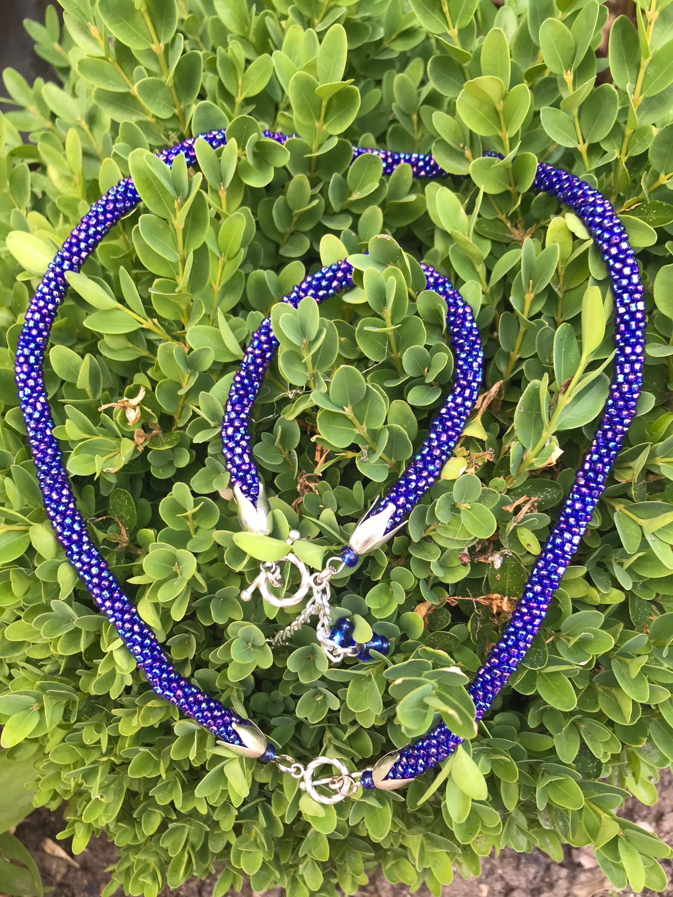 Colliers et pendentifs fantaisie en os perle
