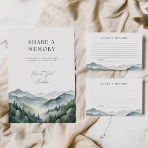 May include: A white card with a watercolor mountain scene and the text "Share a Memory" with a line for writing a memory and the name "Harriet Joel Henderson".