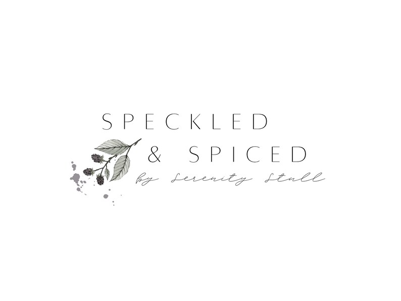 May include: Black and white logo design with the text "Speckled & Spiced by Serenity Stall" and a stylized illustration of a branch with leaves and berries.