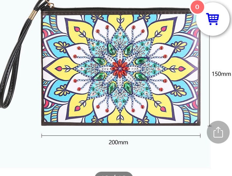May include: A black clutch purse with a colorful mandala design. The purse measures 8 inches by 6 inches.