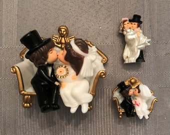 Small Retro Bride and Groom Kissing on a Couch-Vintage Plastic Mini Bride and Grooms for Cake Toppers-Favors-Crafts-Groom Carrying Bride
