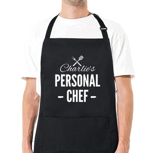 May include: Black apron with a white pocket and the text "Charlie's Personal Chef" with a crossed fork and spatula graphic.