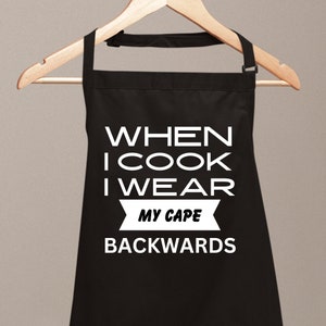When I Cook I Wear My Cape Backwards Funny Aprons for women Novelty Chef Kitchen Aprons for Men BBQ Gift for Him Her Cooking Baking