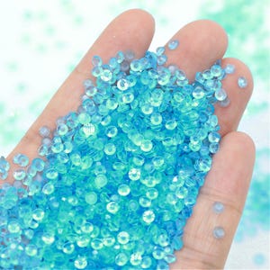Transparent Solid Aqua Jelly (NO AB) Flatback Resin Rhinestones-Glow in the Dark After Exposure to Light