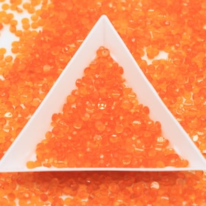 Transparent Solid Orange Jelly (NO AB) Flatback Resin Rhinestones Glow in the Dark After Exposure to Direct Light