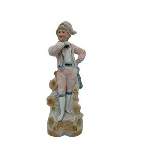 German biscuit porcelain figure of a young man