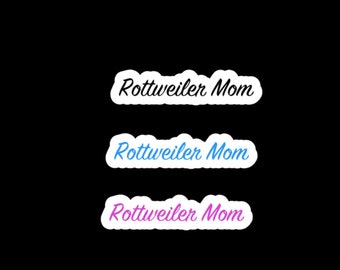 May include: Three white cloud-shaped stickers with the text "Rottweiler Mom" in black, blue, and pink.