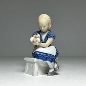 Bing and Grondahl Figurine #2298 Ida&#39;s Flowers, Bing and Grøndahl Porcelain Figurine &#39;Girl with Flowers&#39;