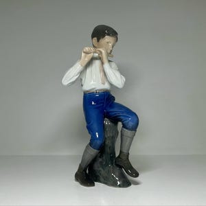 Bing & Grondahl Large Porcelain Figurine #1897 &#39;Boy Playing Flute&#39;, Bing and Grøndahl Flute Player Figurine by Ingeborg Plockross Irminger