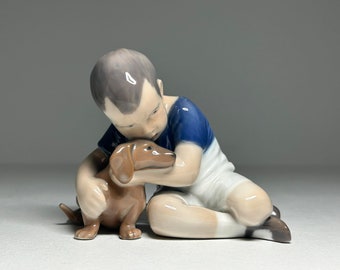 Royal Copenhagen Porcelain Figurine &#39;True Friendship&#39; #1951, Royal Copenhagen Boy with Dog Figurine by Ingeborg Plockross Irminger