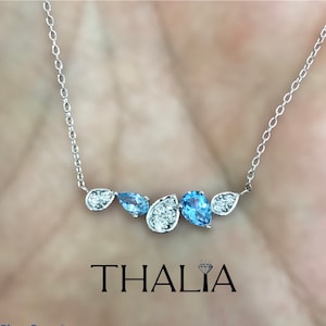 Collana in oro 14 carati con topazio blu, delicato accento di diamanti, pietra portafortuna di dicembre