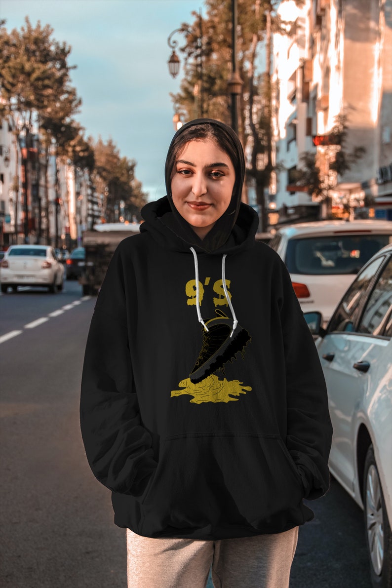 dark charcoal university gold shirt