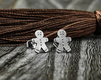 Orecchini a forma di omino di pan di zenzero in resina · Gioielli