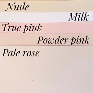 May include: A collection of paper swatches in various shades of pink, beige, and white. The swatches are labeled with the names of the colors: "Nude", "Milk", "True pink", "Powder pink", and "Pale rose". The text is in a cursive font.