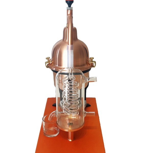 Alembic Distiller for essential oils & hydrosol in copper with glass condensation coil.