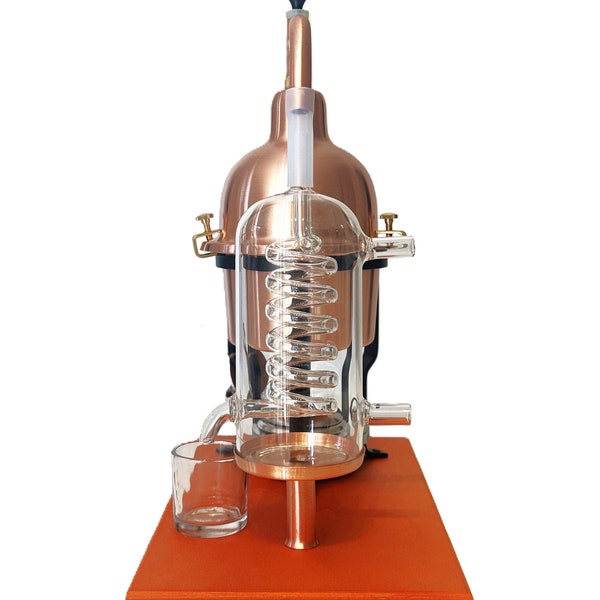 Alembic Distiller for essential oils & hydrolates in copper with glass condensation coil.