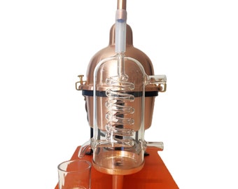 Alembic Distiller for essential oils & hydrosol in copper with glass condensation coil.