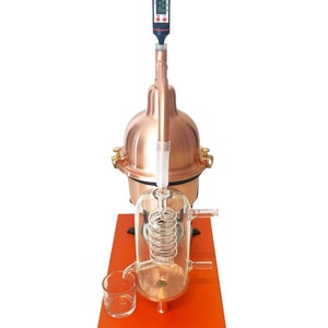 still for essential oils & hydrosol in copper with glass condensation coil