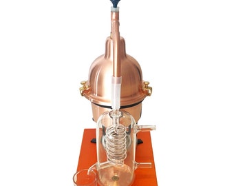 Alambicco Distillatore in rame con serpentina in vetro soffiato capacità 0.6 litri