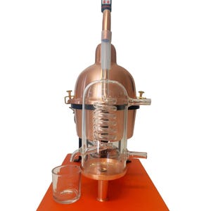 Essential oil & hydrosol distiller in copper with glass condensation coil. capacity 1 liter