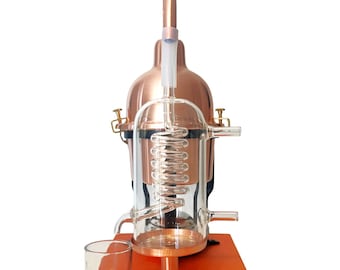 Distiller for essential oils & hydrosol in copper with glass condensation coil.
