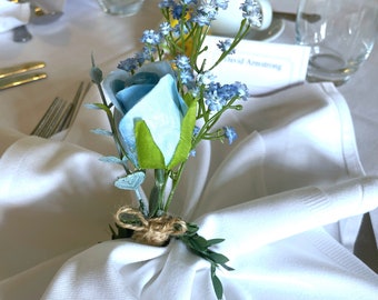 Wedding flower Napkin Rings and Table decorations.