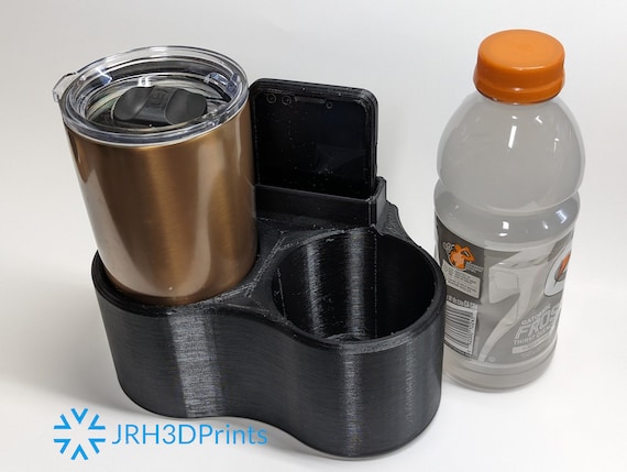 Magnetic water bottle holder outlet