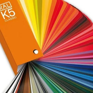 May include: A fan-shaped colour chart with a variety of colours, including red, orange, yellow, green, blue, purple, and black. The chart is labelled "RAL K5 CLASSIC".