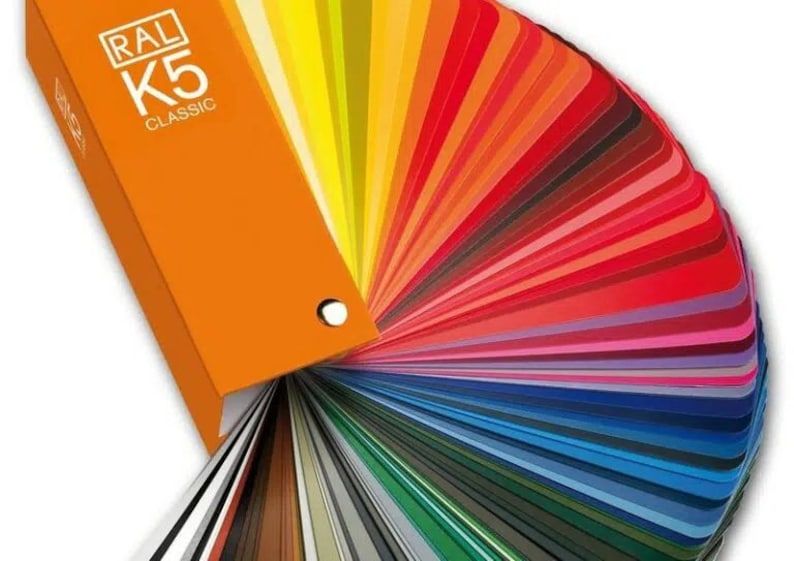 May include: A fan-shaped color chart with a variety of colors, including red, orange, yellow, green, blue, purple, and black. The chart is labeled "RAL K5 CLASSIC".