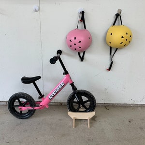 Strider balance bike stand hot sale