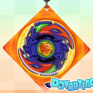 May include: A colorful, diamond-shaped keychain featuring a detailed graphic of a spinning top toy. The design incorporates blue, green, orange, and red elements, with the word "GRIZZER" visible. The keychain is attached to a silver clasp.