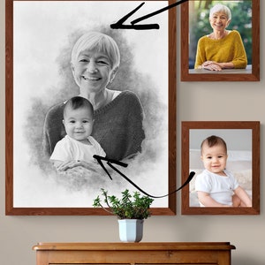 May include: A black and white pencil sketch of a grandmother and grandchild. The grandmother is smiling and holding the child. The child is looking at the camera. The sketch is framed in a brown wooden frame.