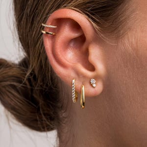 Elegant CZ Earring Set – 4 Pairs (8 Pieces) – Gold & Silver Ear Stack