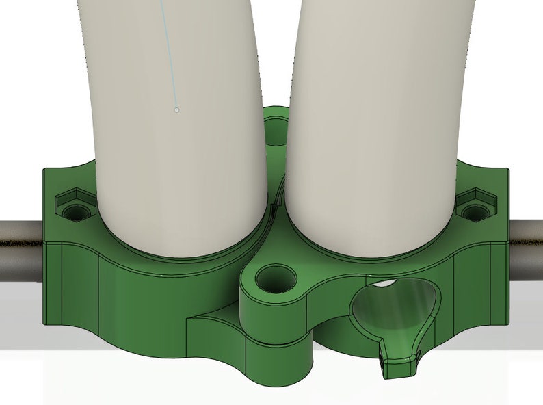 May include: Green plastic pipe connector with two white pipes attached. The connector has a hole in the center and a screw on each side.