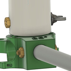 May include: A green metal pipe clamp with a white cylinder attached to it. The cylinder has a gold-colored cap and a black knob with a wing nut. The clamp is attached to a gray pipe.