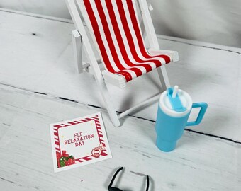 Elf Relaxation Day Nightly Prop set up: Beach Chair, Sunglasses, mini Tumbler