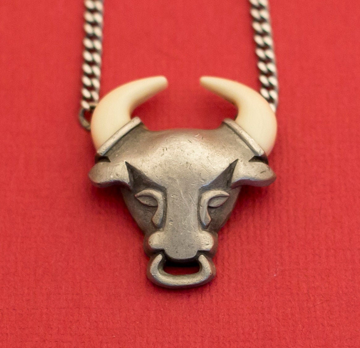 Avon bull best sale necklace