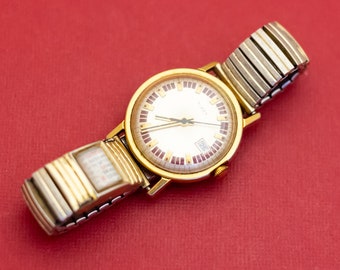 7 inch, vintage cirkelvormig analoog centrum tweekleurig horloge van Timex - F52