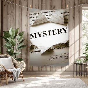 May include: A large white paper with the word "MYSTERY" in bold black letters is displayed. The paper is torn, revealing handwritten text underneath. The image is hung on a clothesline in front of a wooden wall.