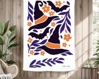 May include: White Halloween-themed tapestry with a repeating pattern of witch hats, bats, orange flowers, and purple leaves. The witch hats are black with orange bands. The tapestry is hanging on a clothesline.