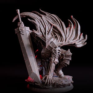 May include: A detailed figurine of a warrior in dark armor, kneeling and holding a large sword. The figure has a flowing cape and is set against a black background with red lighting, highlighting the intricate details of the sculpture.