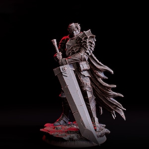 May include: A detailed figurine of a warrior in dark armor, holding a large sword. The figure stands on a rocky base, with a cape draped over its shoulders. The overall color scheme is dark, with red lighting adding dramatic highlights.