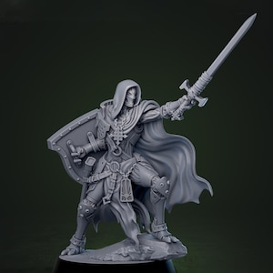May include: A gray figurine of a hooded warrior, holding a sword aloft and a shield. The figure is clad in armor and a flowing cape, standing on a textured base. The warrior's pose suggests action, with the sword raised in a striking position.