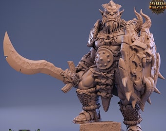 May include: A detailed miniature figurine of an Orc warrior, painted in a brown and grey color scheme. The Orc is holding a sword in one hand and a shield in the other. The shield is decorated with a snarling beast's face. The miniature is standing on a small base.