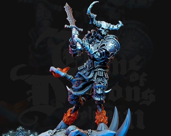 May include: A black and silver demon miniature with horns, a sword, and a chain. The miniature is standing on a rocky base with skulls and flames. The miniature is part of the "Tome of Demons" collection.